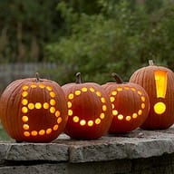 Boo carved in pumpkins